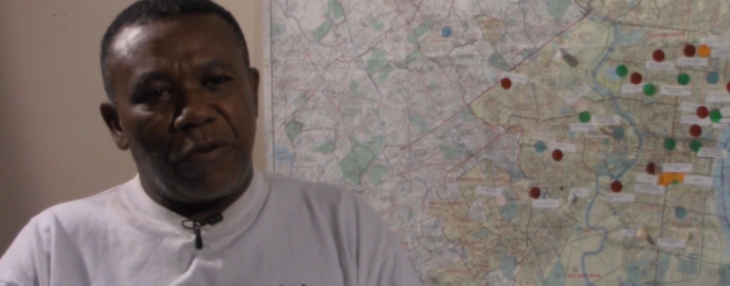 Man in front of a map