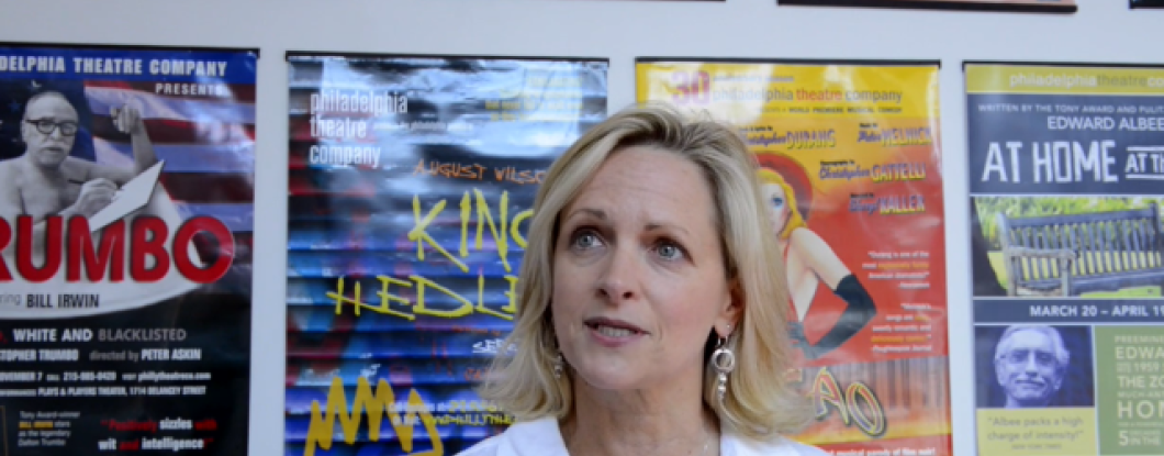 talking in front of posters