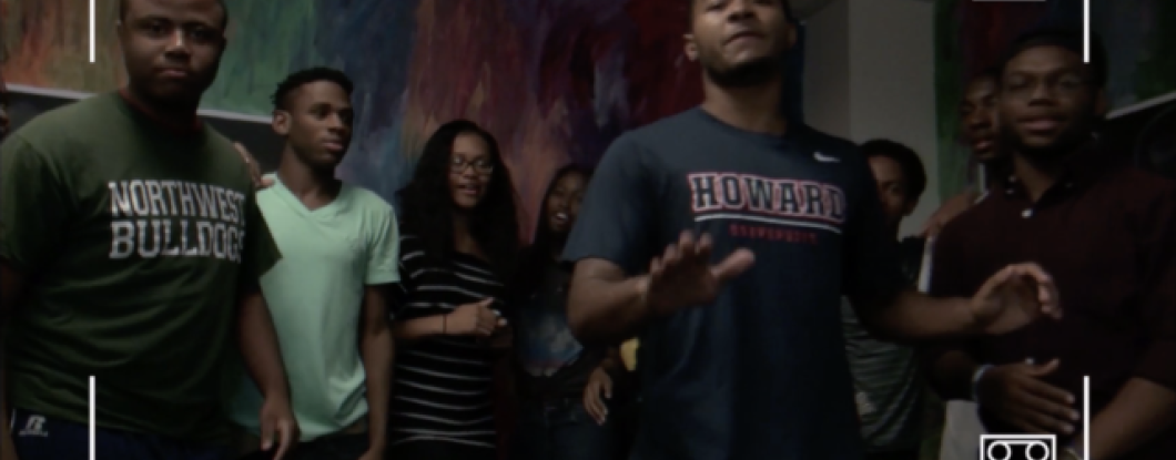 A ground of young men freestyle rapping