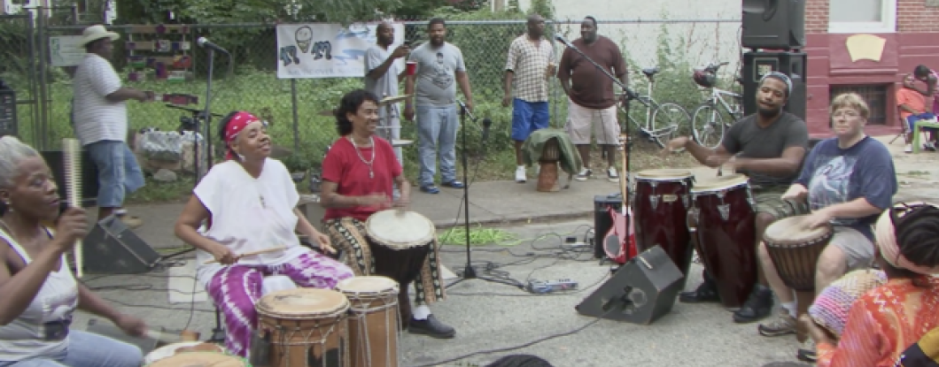a drum circle in the street