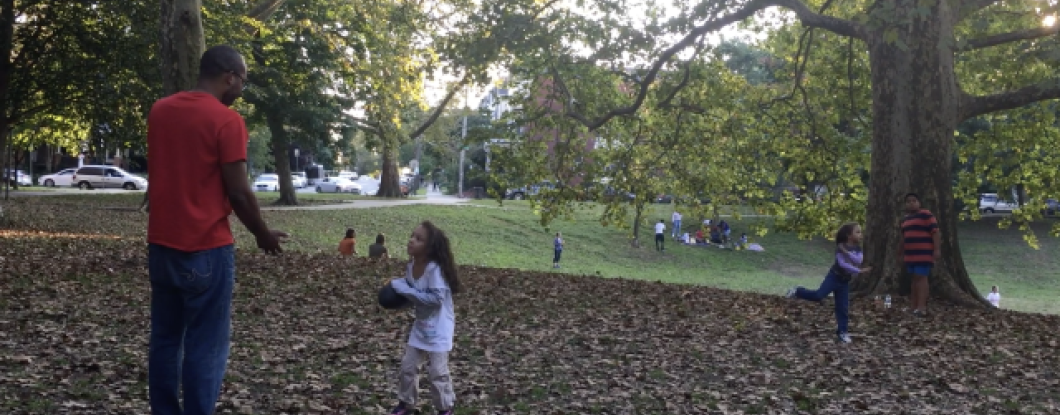 A group of families in Clark Park, West Philadelphia