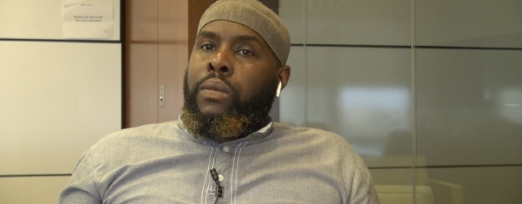 Man being interviewed