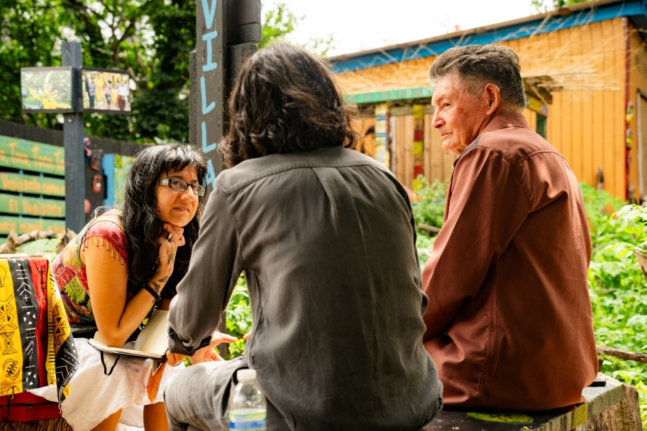people having a conversation in the gardens