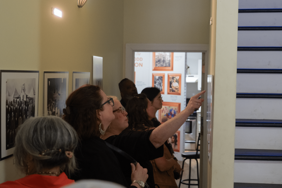 people viewing the pyramid club installation
