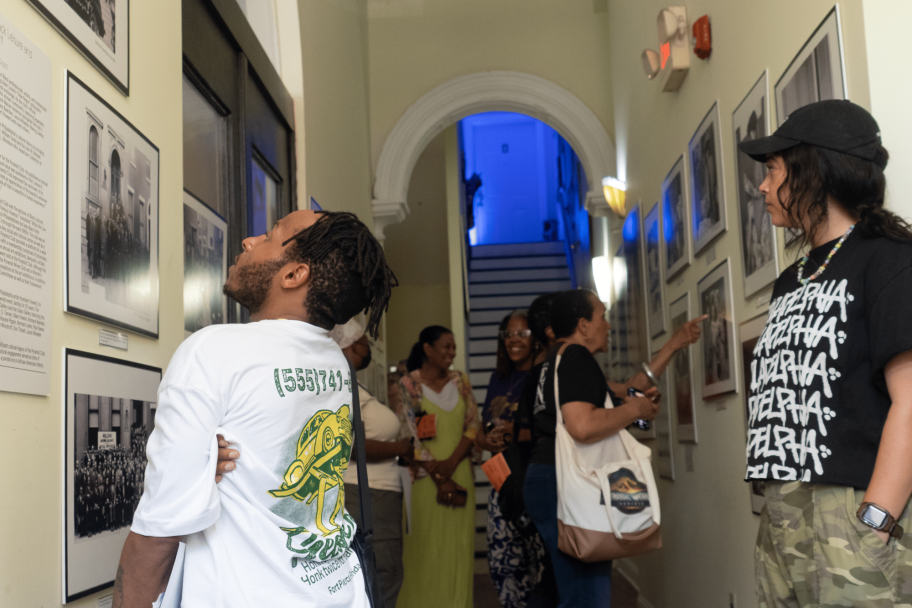 people viewing the pyramid club installation