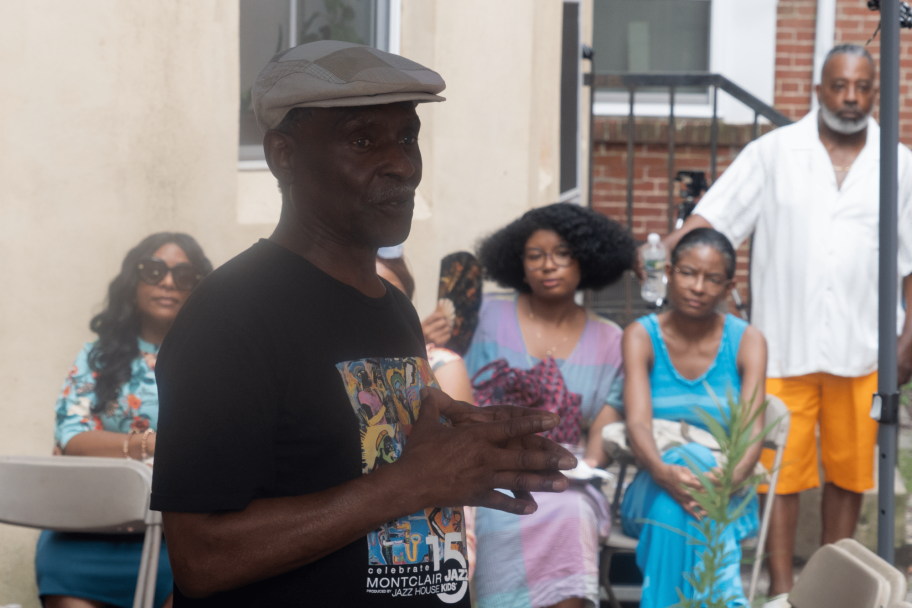 man speaking to crowd