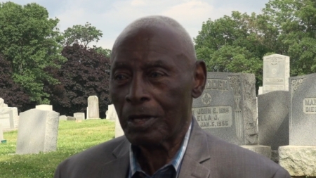 Charles Blockson talking in cemetery