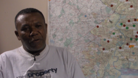 Man in front of a map