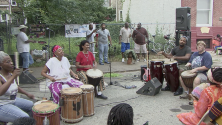 a drum circle in the street