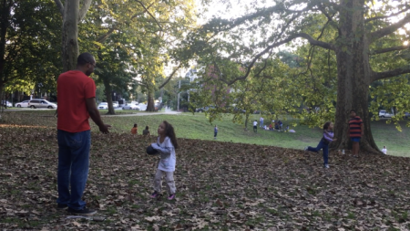 A group of families in Clark Park, West Philadelphia