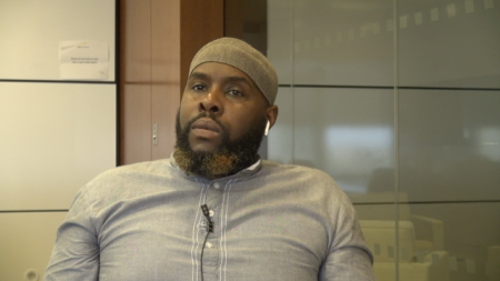 Man being interviewed